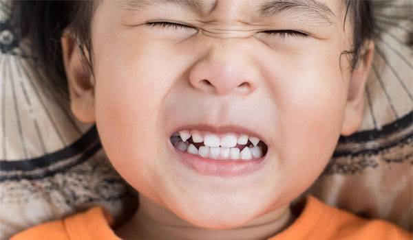 Nghiến răng khi đi ngủ là gì? Gợi ý một vài mẹo trị nghiến răng khi ngủ - Ảnh 2.