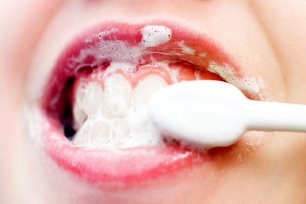 Những thói quen xấu dẫn đến đau răng - Ảnh 1.