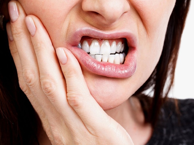 Đặt thuốc diệt tủy răng có đau không? Cách giảm đau khi đặt thuốc diệt tủy - Ảnh 1.