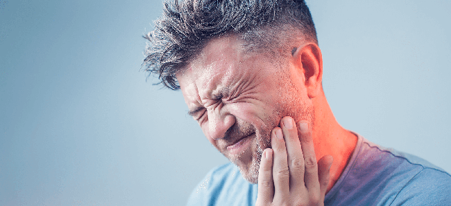 Triệu chứng đau răng: Nguyên nhân, điều trị và cách phòng ngừa - Ảnh 1.
